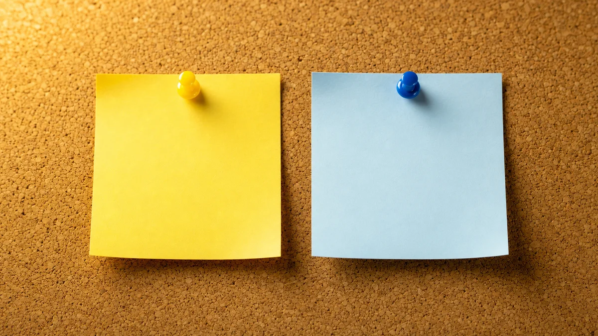 Macro close-up of two sticky notes labeled Proven and Speculative pinned to a corkboard